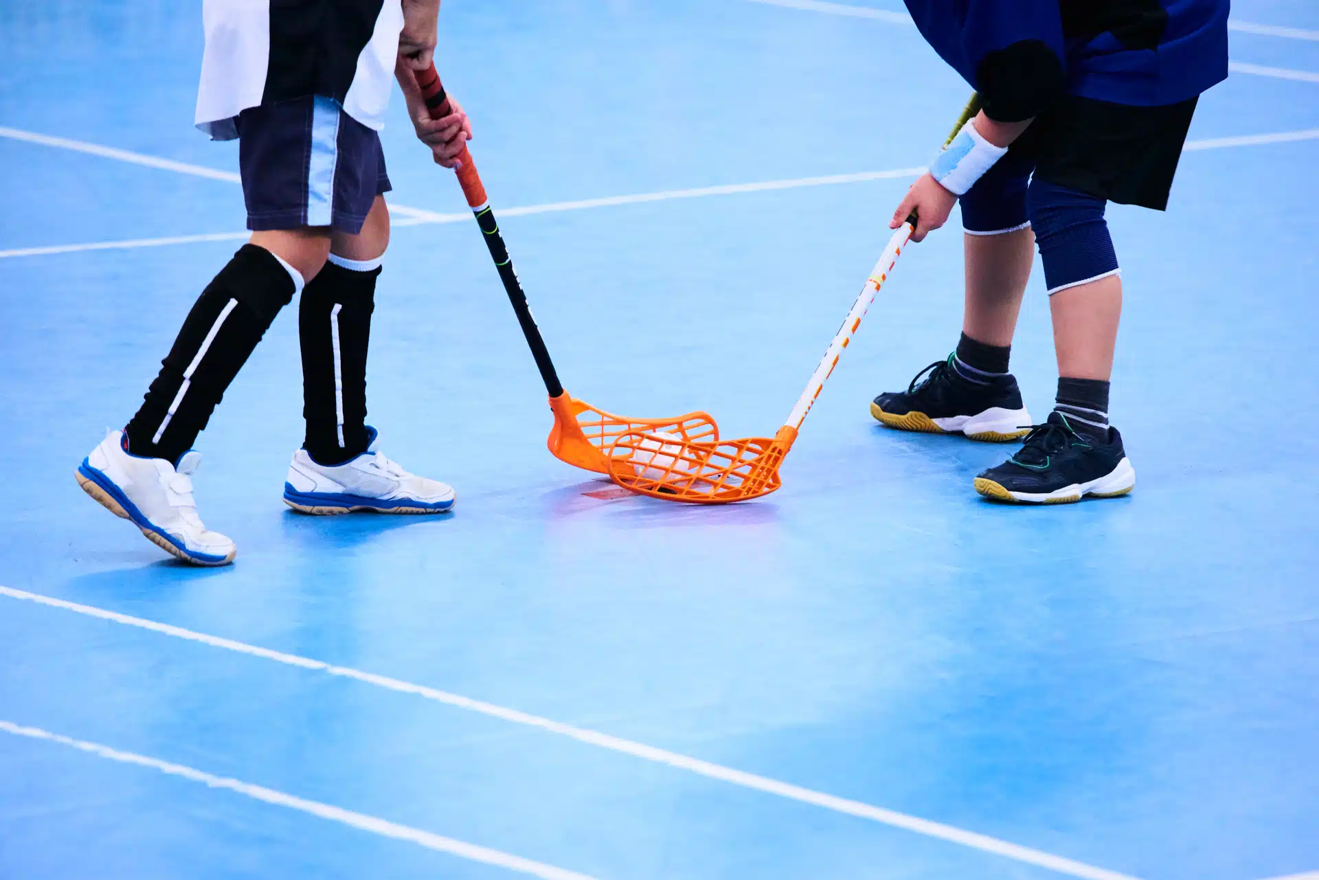 Bilde av to personer som spiller innebandy - Råde IL - Idrettslag